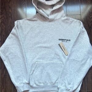 New Essentials Gray Hoodie with dust bag
